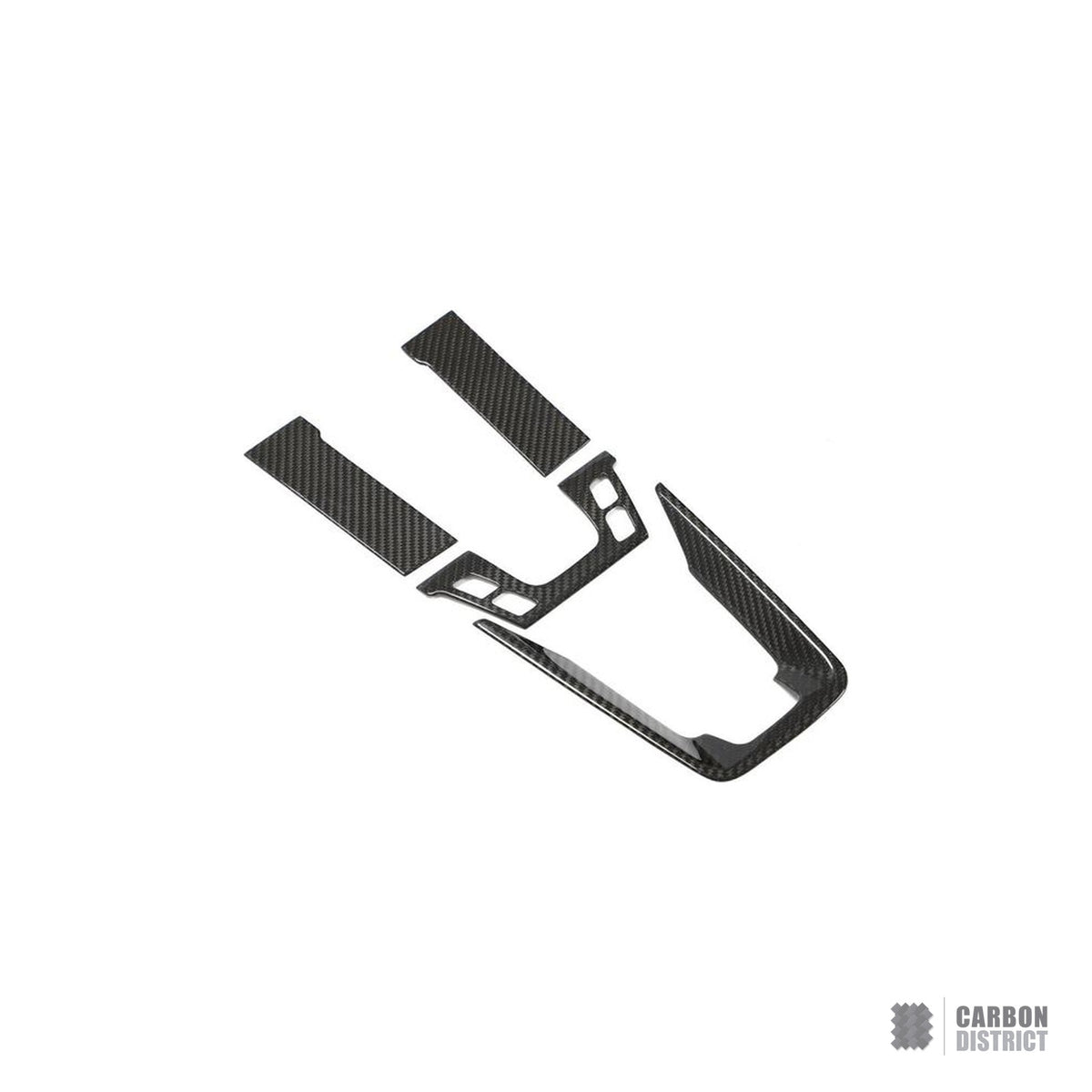 Porsche 911 992 Turbo S carbon fibre interior trim set laid out on white