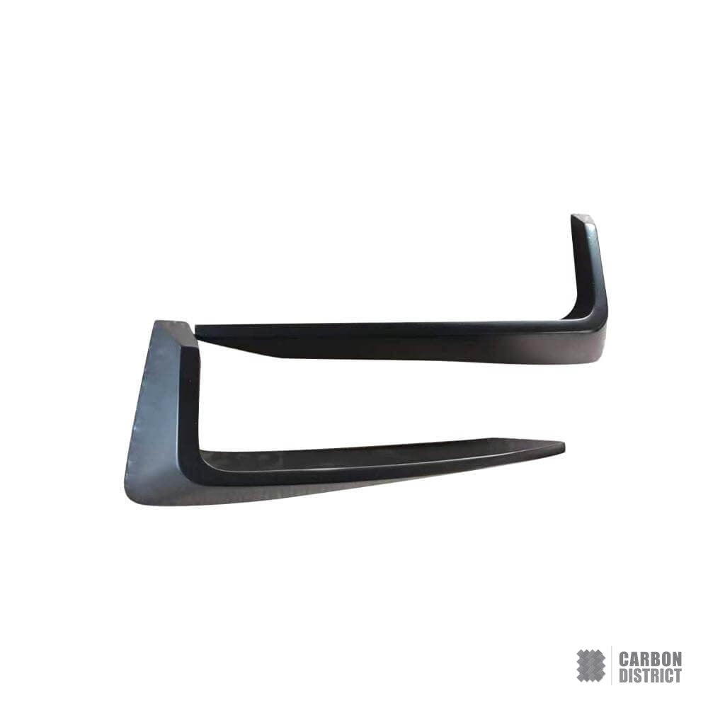Land Rover Defender (90,110,130) carbon fibre front canards — made to order in genuine carbon fibre