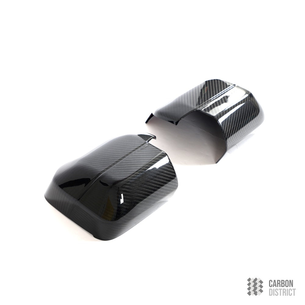 Land Rover Defender (90,110,130) carbon fibre mirror caps — 3K twill gloss finish