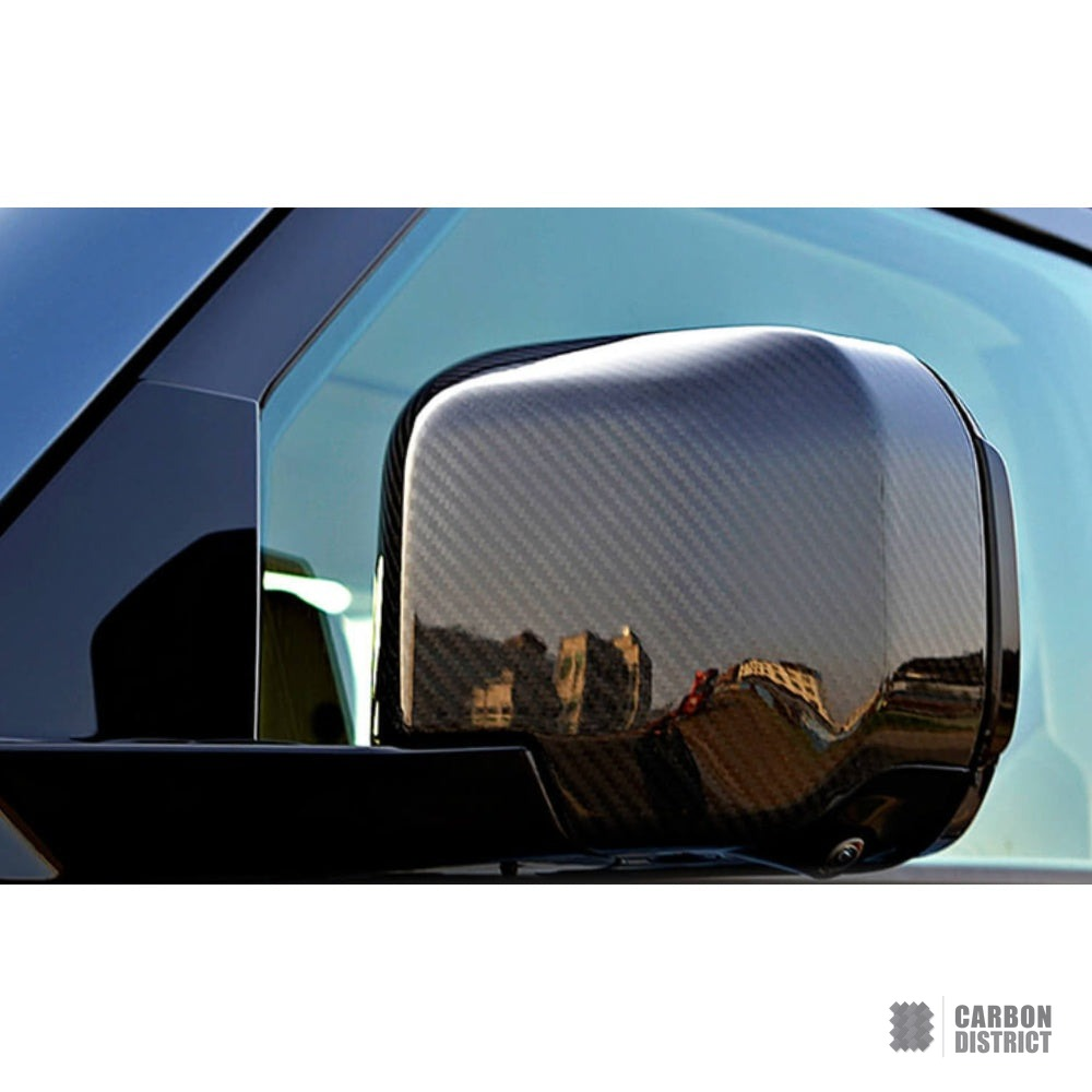 Land Rover Defender (90,110,130) carbon fibre mirror caps — UV-stable gloss finish detail