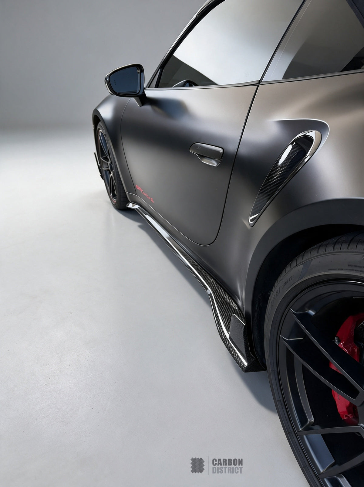 Porsche 911 Turbo S (992.1) dry carbon fibre side skirts — fitted, studio