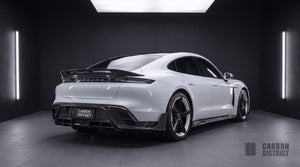 Porsche Taycan carbon fibre body kit with ducktail spoiler, rear three-quarter