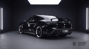 Porsche Taycan carbon fibre body kit with raised wing, rear three-quarter
