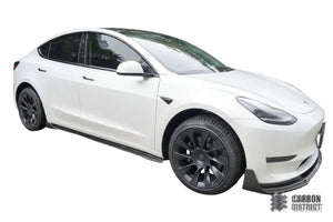 Tesla Model Y carbon fibre side skirts — UV-stable gloss finish detail