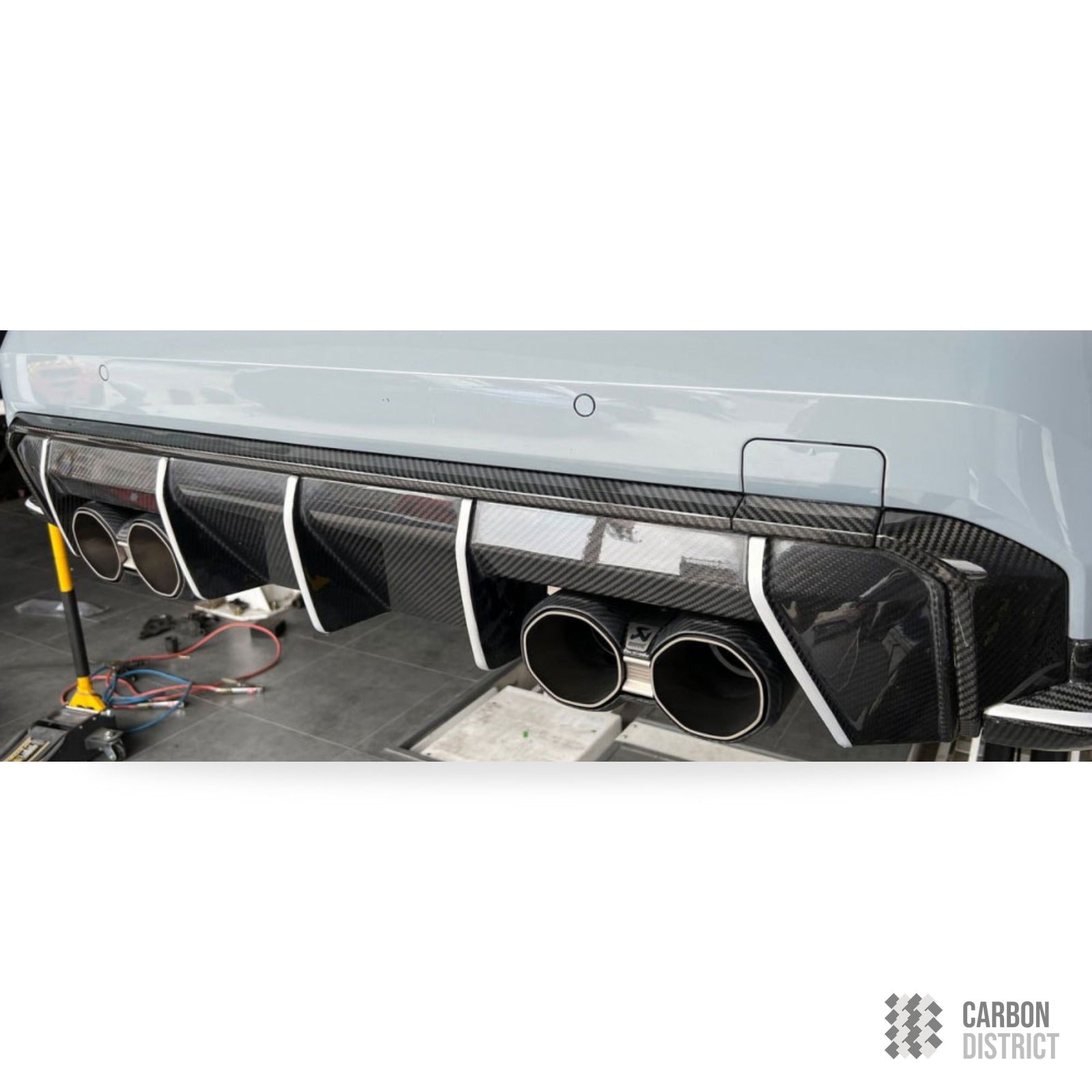 BMW M3/M4 (G80/G82/G83) Prepreg carbon fibre rear diffuser trims — made to order in genuine carbon fibre